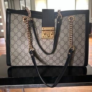 Gently Used Gucci Black and Gold Shoulder Bag with Padlock Closure